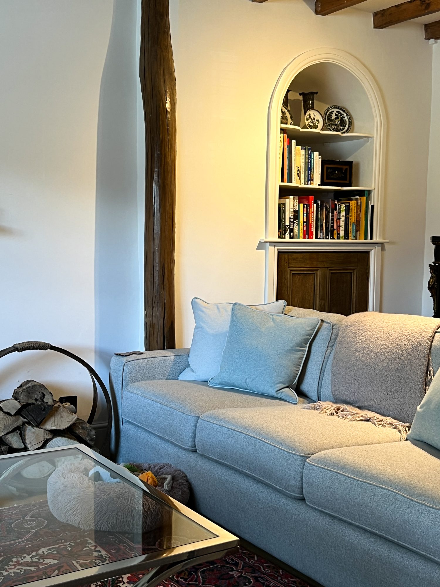 Sitting room with William Morris style botanical cushions in a Yorkshire cottage